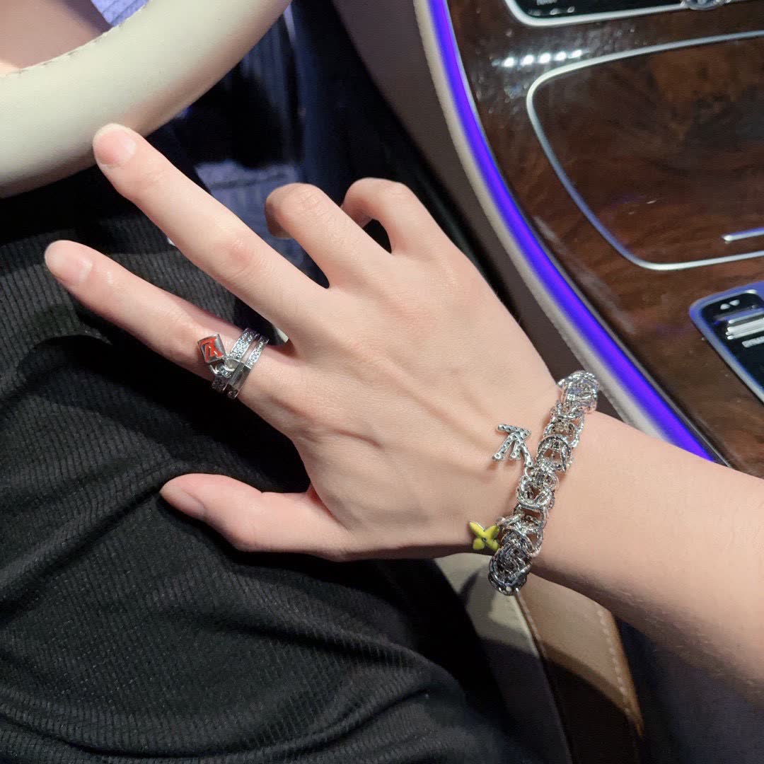 Louis Vuitton Silver Bracelet with Yellow Flower Charm